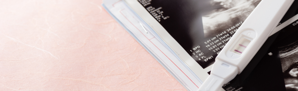 Skincare Products to Avoid During Pregnancy: A Mom-to-be Guide 1 Close-up of a positive pregnancy test showing two lines on a white plastic device.