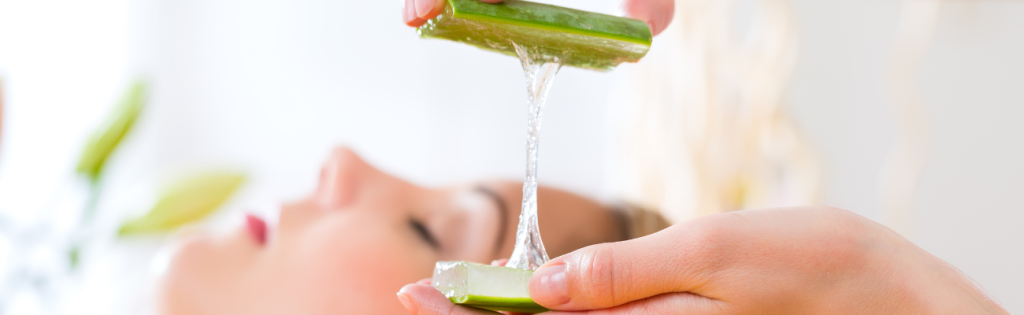 Practitioner preparing a natural aloe vera mask for a skincare treatment in a clinic or spa setting.
