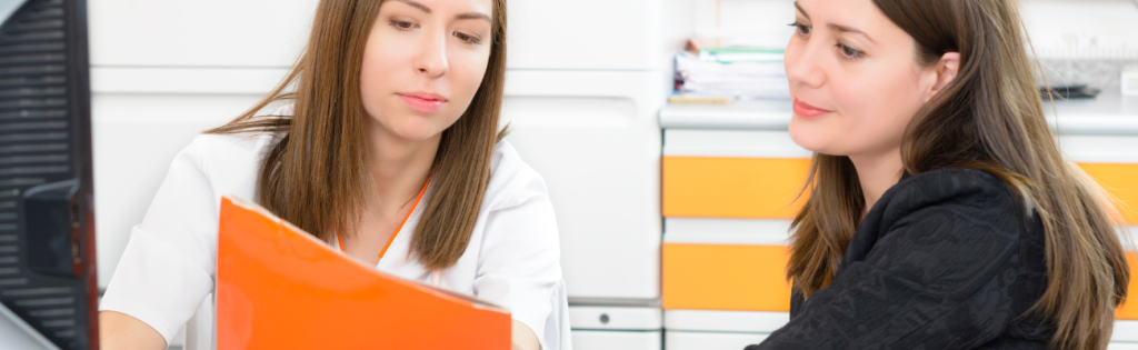 Top 7 Concerns of Patients: What You Need to Know! 1 Aesthetic practitioner discussing treatment details with a patient during a consultation.