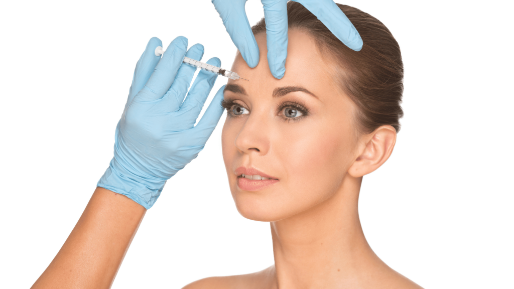 The Botox Buzz: Understanding the Pros, Cons, and What to Expect in a Consent Form 1 A cosmetic nurse administering a Botox injection to a woman’s forehead in a clean, well-lit clinic.