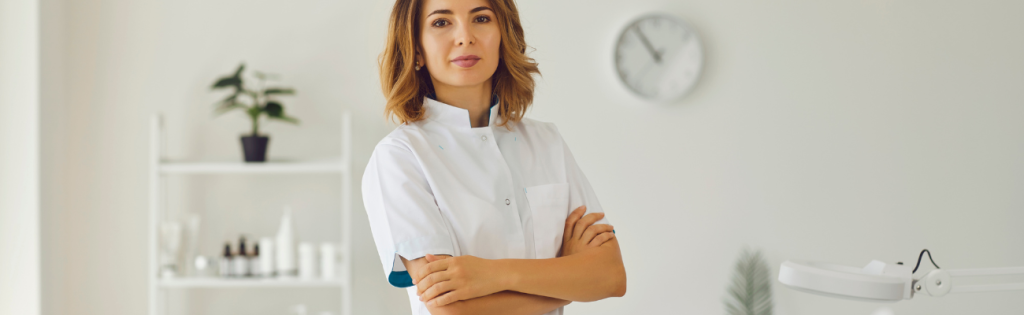 Unleash Your Aesthetic Clinic's Potential: The Ultimate Guide to Building a Skilled Team! 2 Qualified practitioner in clinical attire, ready to perform aesthetic treatments.