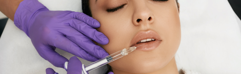 Lip Fillers in the UK: What You Need to Know About This Popular Cosmetic Procedure 2 Woman undergoing a dermal filler procedure performed by a qualified aesthetic practitioner in a clinical setting.