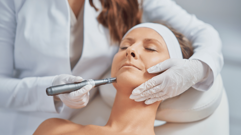 Faces | Summer-Ready Skin with Microneedling 1 Woman receiving microneedling treatment from a qualified practitioner.
