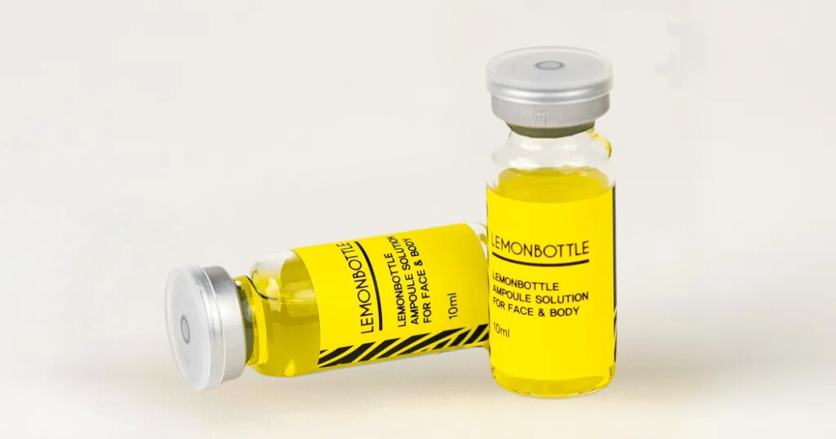 Lemon Bottle Fat Dissolving: 5 Reasons Why It's Popular! 4 Close-up of Lemon Bottle fat dissolving product next to syringe, ready for use in a non-surgical aesthetic procedure.