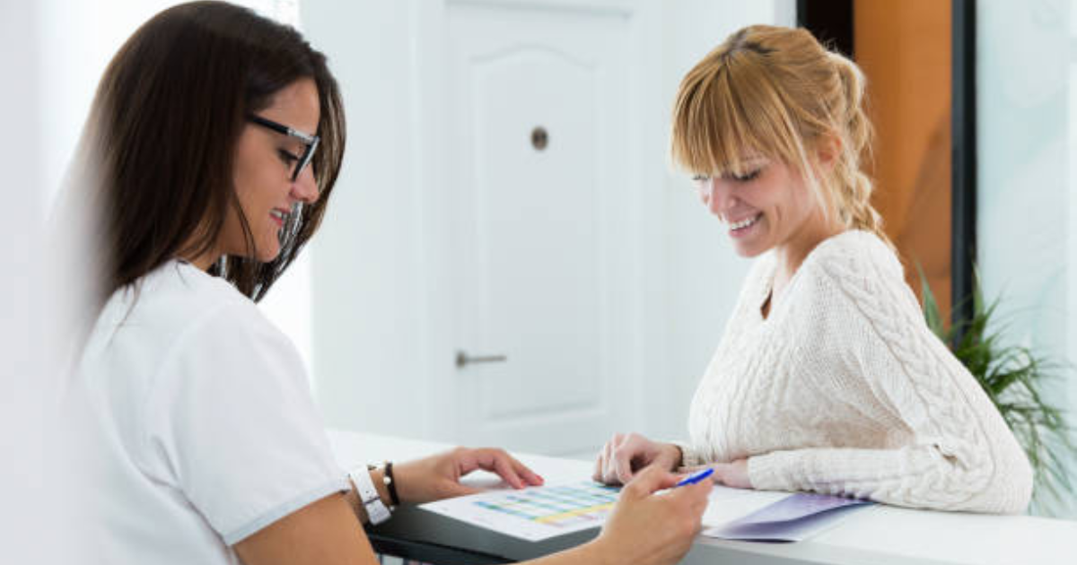 Practitioner speaking with a client