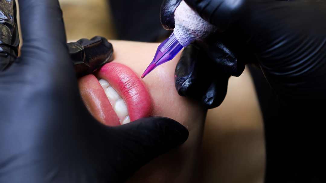 5 Important Reasons Why A Booking System for SPMU Matters 2 Skilled SPMU artist applying semi-permanent brows or lip tint.