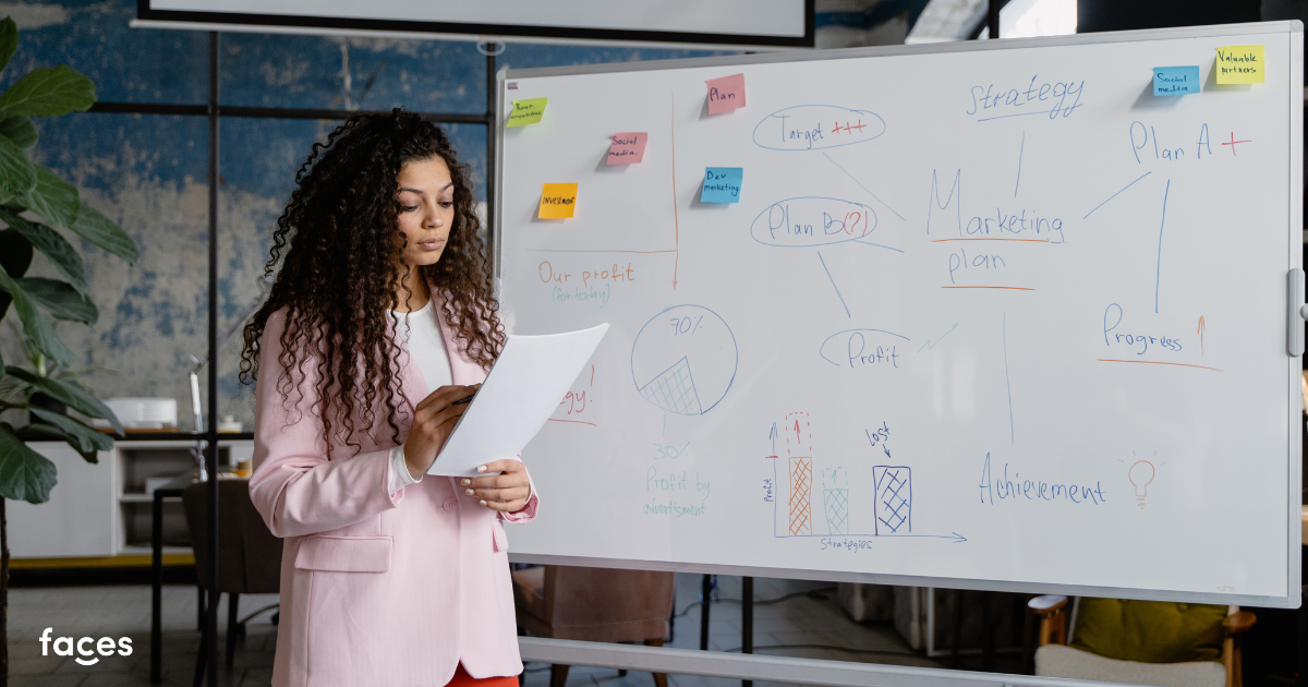 Aesthetic practitioner reviewing a detailed marketing plan for their clinic.